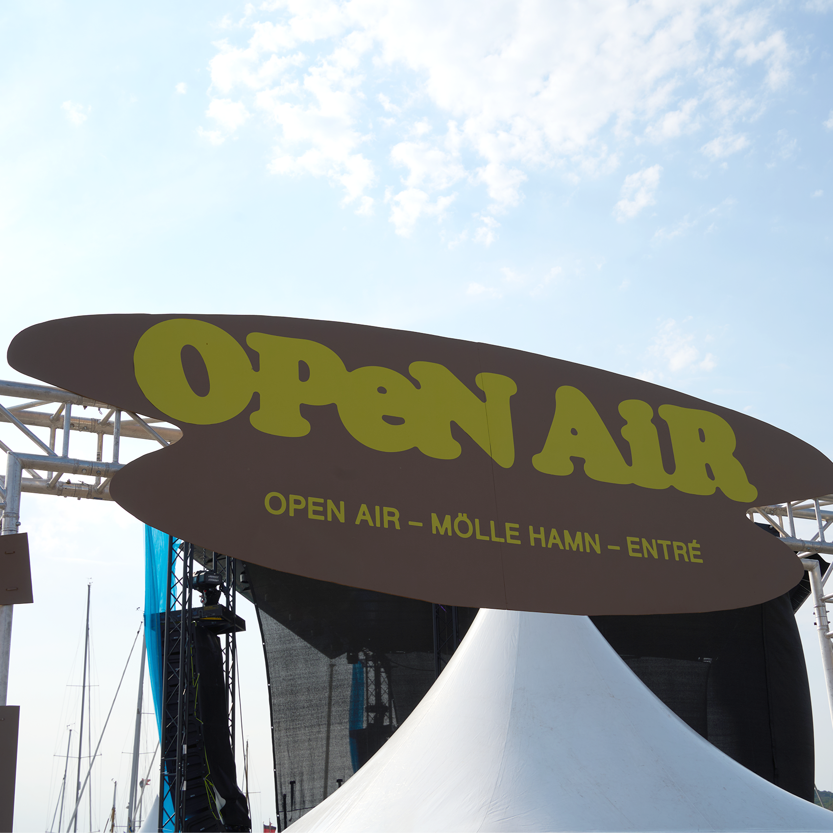 Open Air Mölle festival entrance sign in front of the main stage