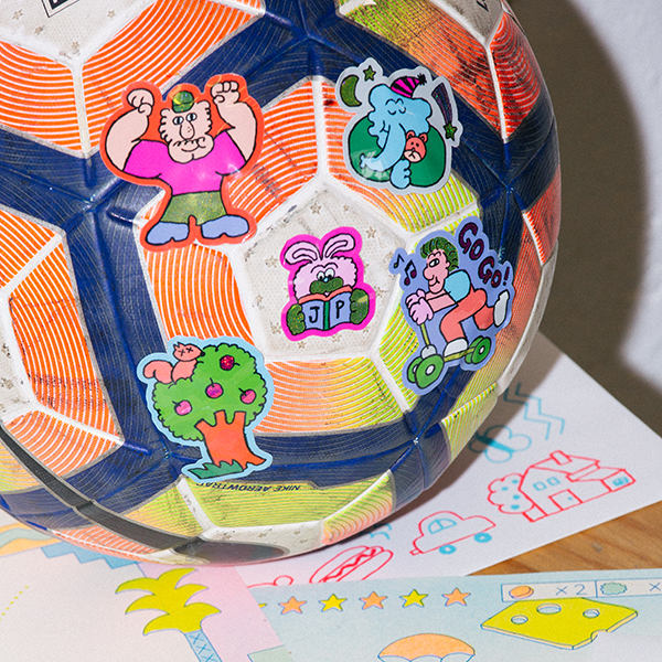 glitter and pixie dust stickers put on a football